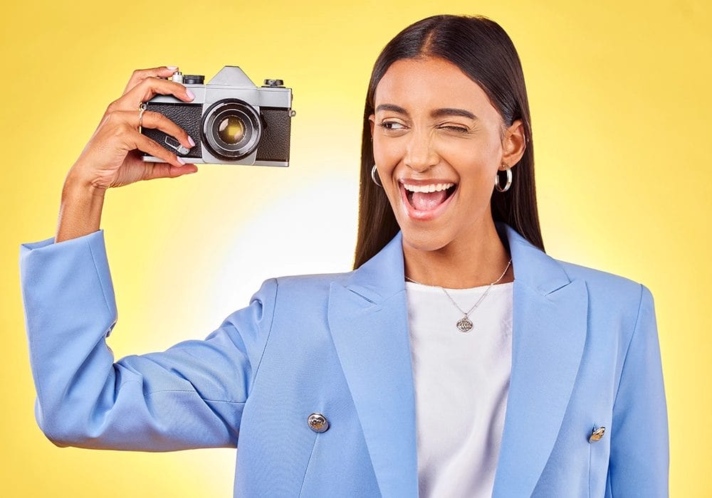 Influencer Endorsements as a social proof - woman with camera