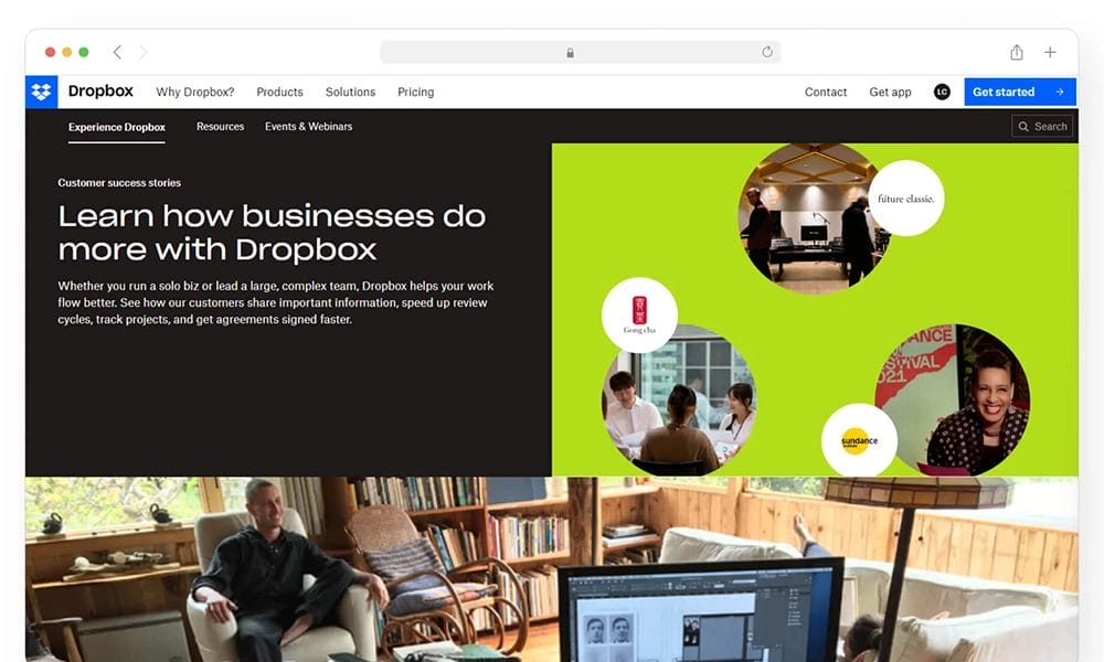 Screenshot of the Dropbox homepage, featuring a social proof ad about business solutions, images of collaborative work settings, and navigation options.